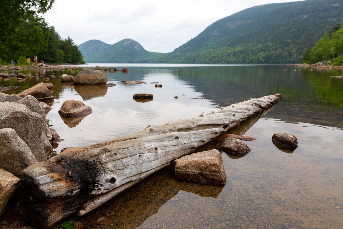 The Bubbles and Pemetic Mountain reflected in the still water of Jordan Pond, Acadia National Park, Maine. National Park Service photo.