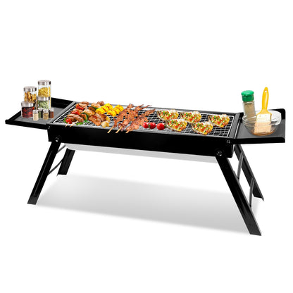 Foldable stainless steel charcoal grill set up for tabletop barbecue