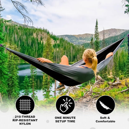 Hammock tree straps with adjustment loops around tree trunk