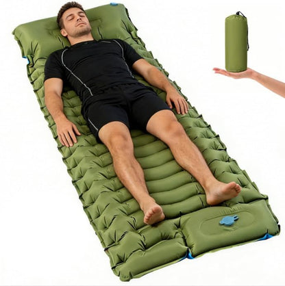 Self-inflating camping mat with built-in foot pump, rolled for packing