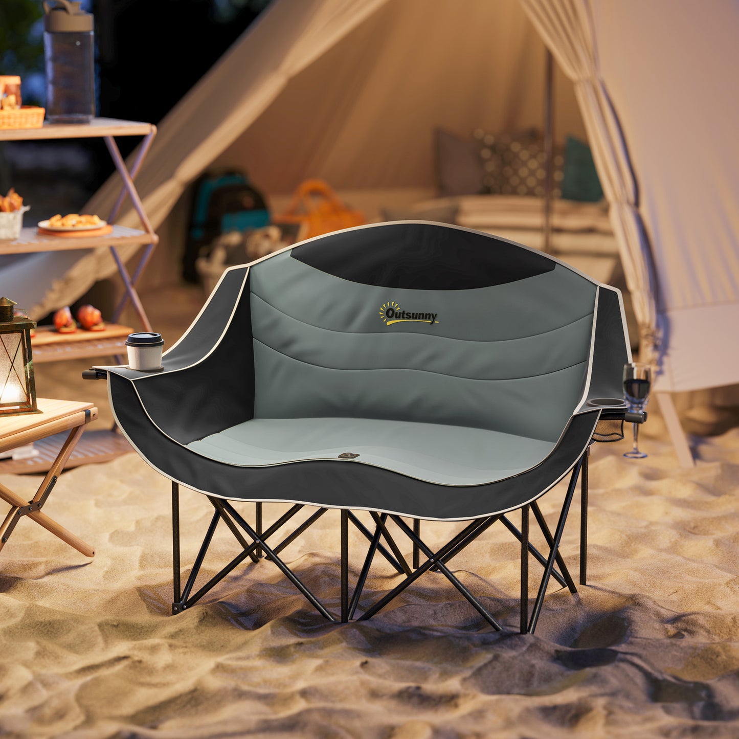 Two-person folding camping chair in black, padded seating