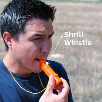 CAMPONGO™ 5-in-1 survival whistle in bright orange being used by a man outdoors with a lanyard around his neck