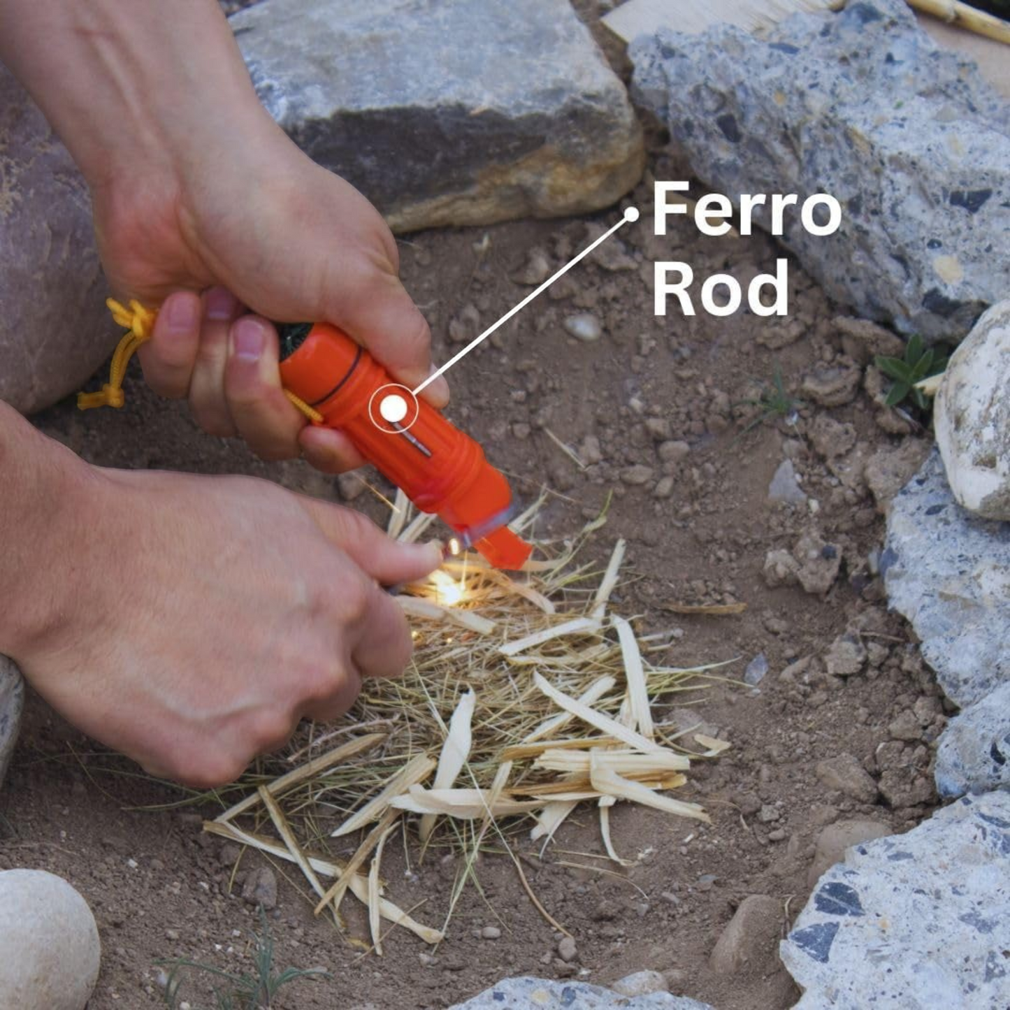 CAMPONGO™ 5-in-1 survival whistle being used to strike a spark with the integrated ferro rod into dry tinder